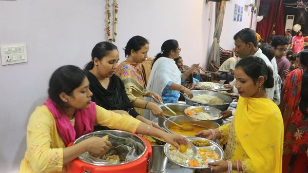 Serving food to the church after the service